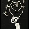 "Free Peltier or Native Prisoners" Sterling Silver Chain and Handcuff w/ Feather Pendant